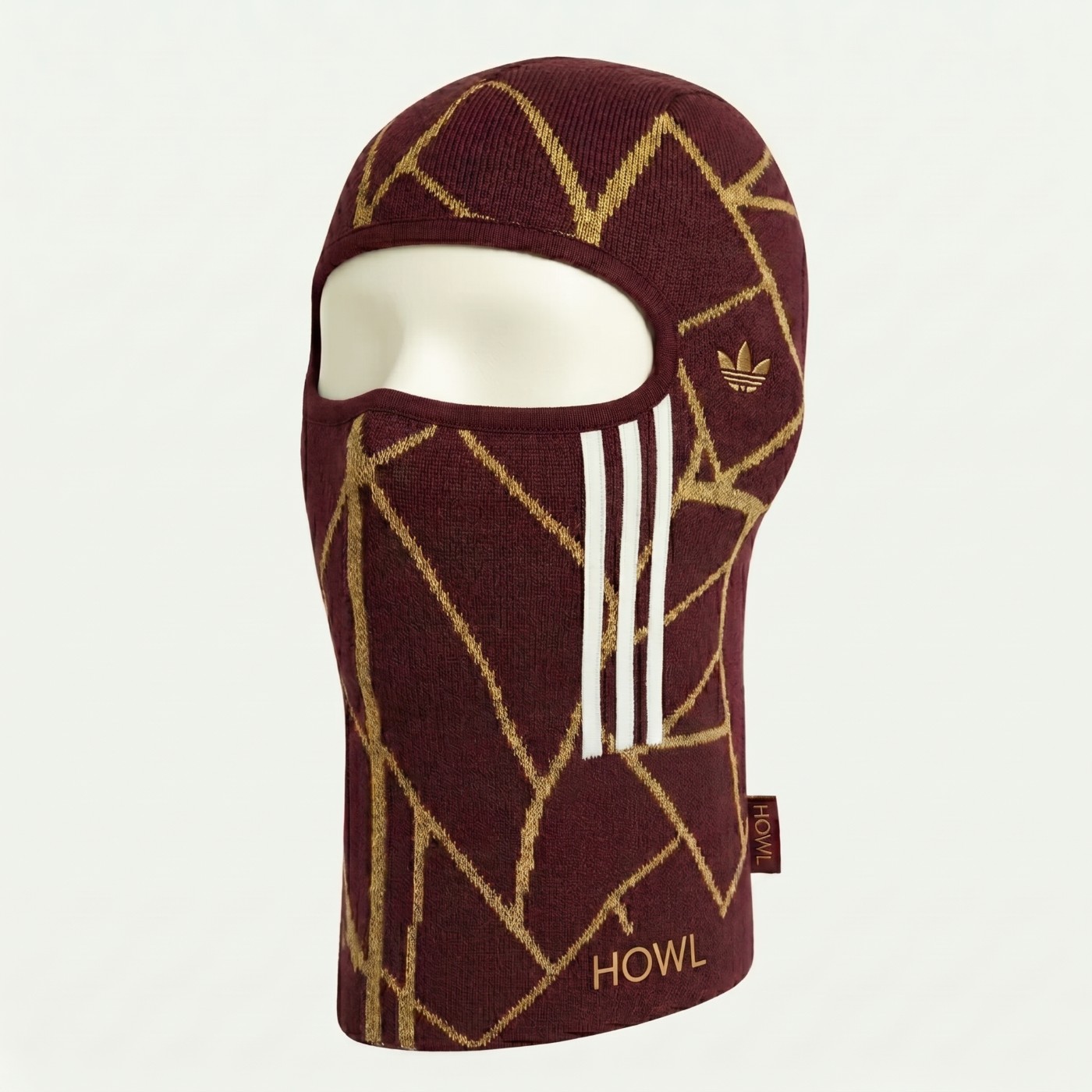 HOWL × adidas knit balaclava, burgundy with gold jacquard lines and three stripes