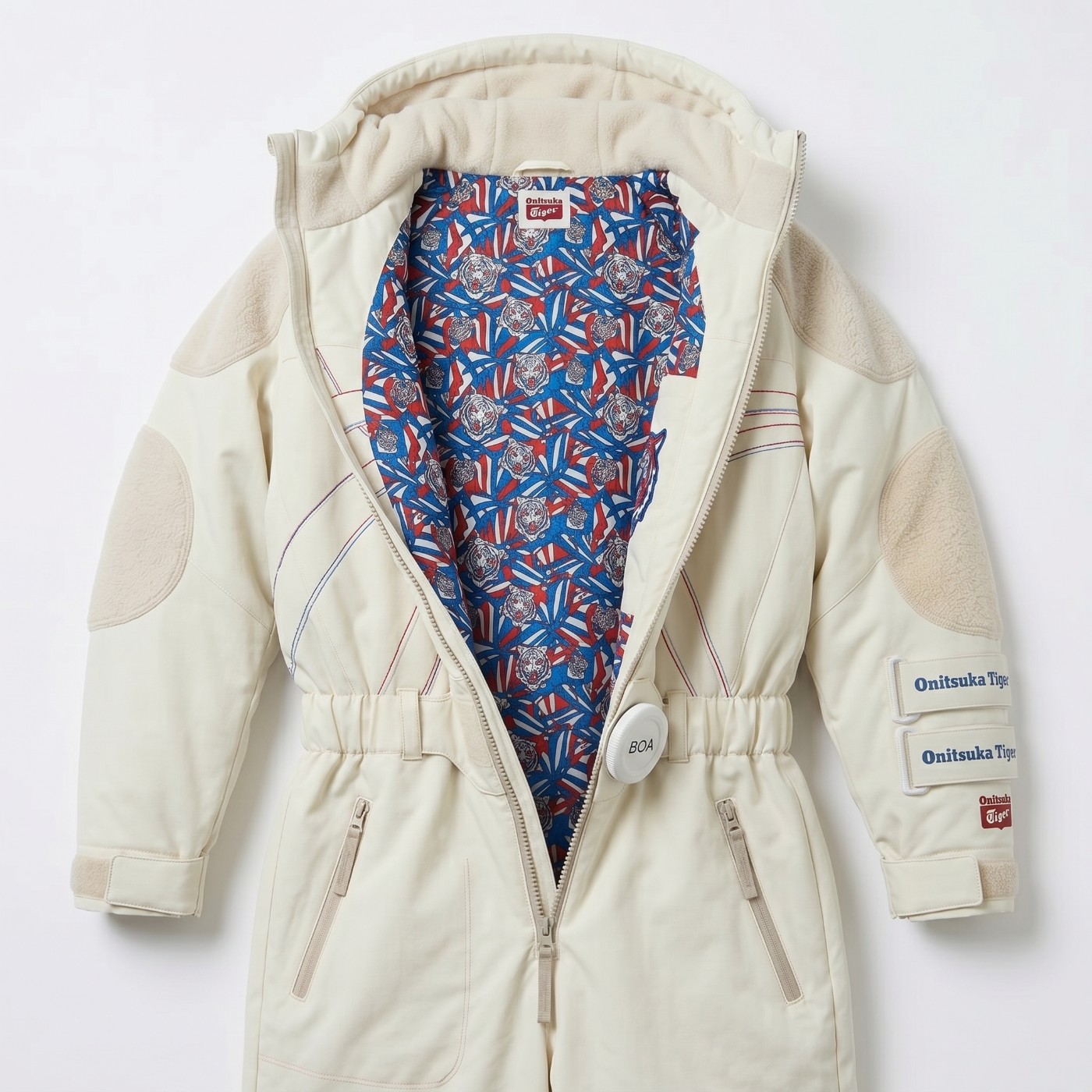 Onitsuka Tiger one-piece snow suit open, showing tiger print lining