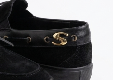 Boat shoe skate concept — gold S hardware and lacing detail