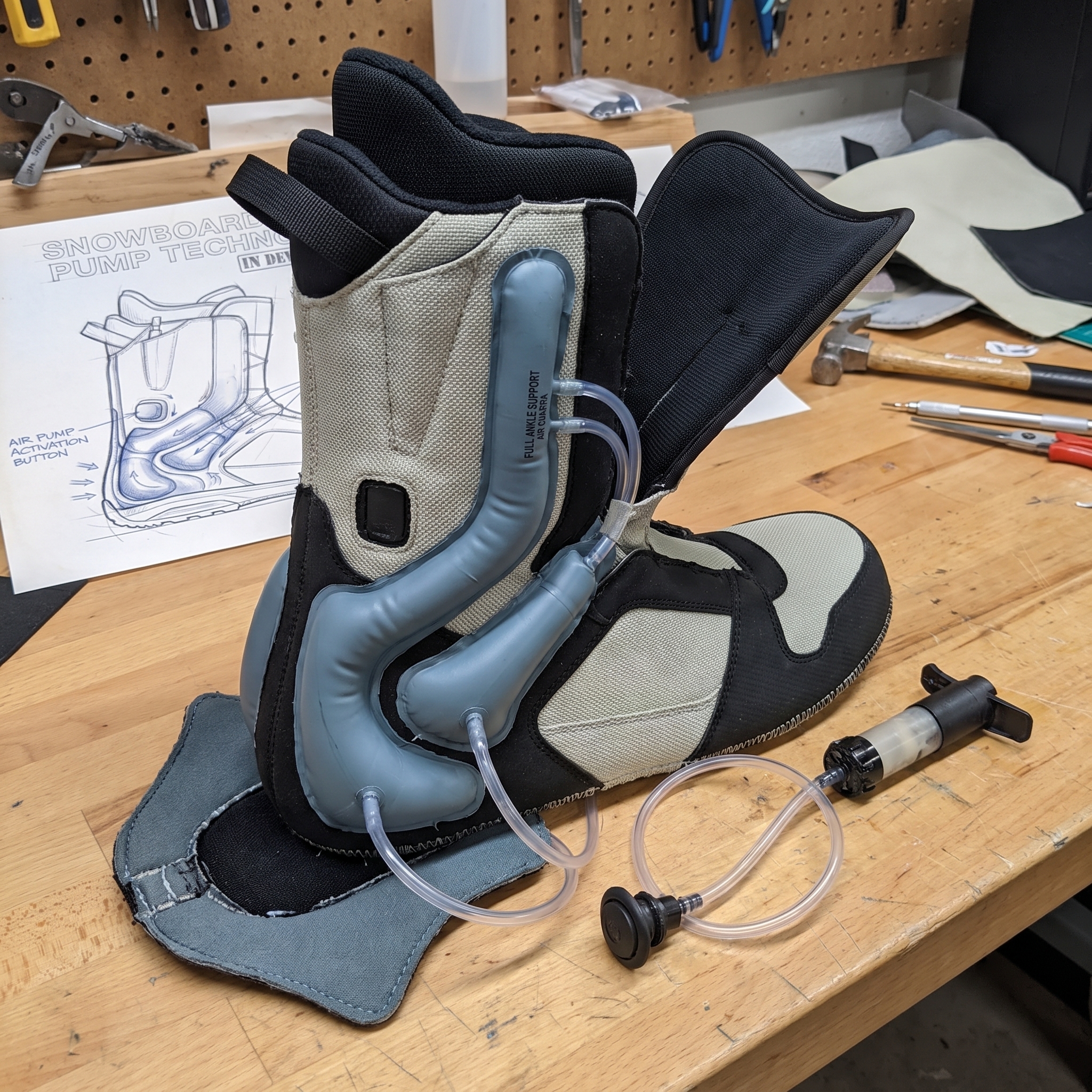 Boot pump — bladder and hand pump prototype on the bench
