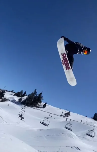 Board on snow / rider shot