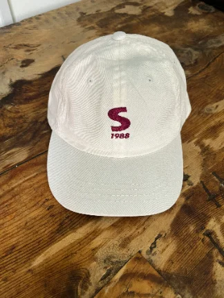 Front — embroidered wordmark